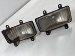 1955 Cadillac Accessory Fog Light Housings G5. Fixed Price $225.00.