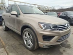 2015 Volkswagen Touareg Front Driver Seat Belt Retractor Tan Used 3951961. Fixed Price $92.62.