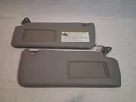 2004-2005 Toyota RAV4 Driver & Passenger Side Sun Visor Pair Set Light Gray Oem. Fixed Price $69.00.