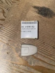 Genuine Jaguar XK8 X308 Child Restraint Rear Seatbelt Bracket Cover HNE2107AAAGD. Fixed Price $32.00.