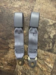 Nos 85-88 Camaro Firebird Trans Medium Dk Gray (82) Rear Seat Belt Buckle Set. Fixed Price $215.00.