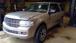 Navigator 2008 Passenger Rear Seat Belt Retractor, Tan. Fixed Price $85.00.
