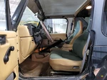 Front 1998 Wrangler Black. Fixed Price $120.00.