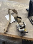 2005-2008 Lincoln Town Car Front Left Driver Seat Belt Retractor Tan. Fixed Price $270.00.